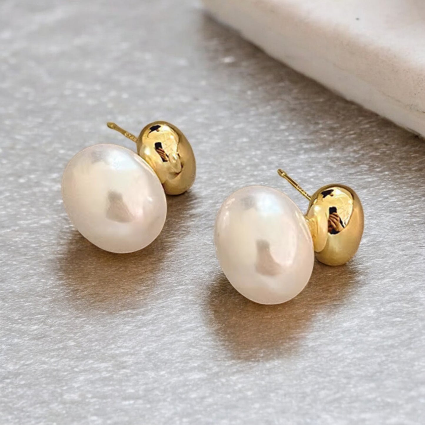 Luxe French Gold and Pearl Accent Earrings_Lifeluxe jewelry trending beautiful_Indulge in pure luxury with these stunning Luxe French Gold and Pearl Accent Earrings. The combination of classic flat pearls and a modern gold splice design creates an accessory that will elevate any outfit for any occasion.